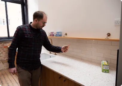The tester closer to the counter as the app announces the product category